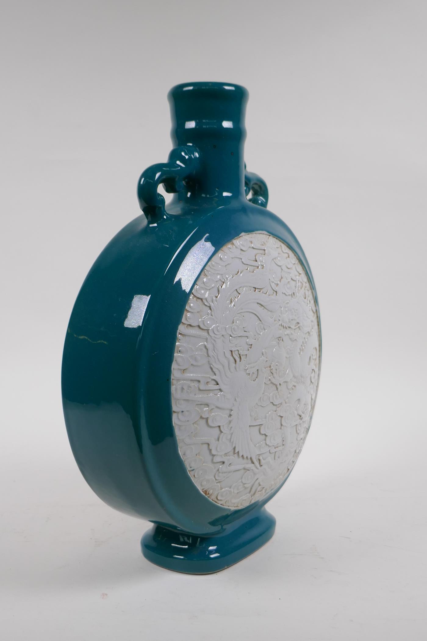 An emerald green glazed porcelain two handled moon flask with a white ground panel and raised dragon - Image 6 of 6