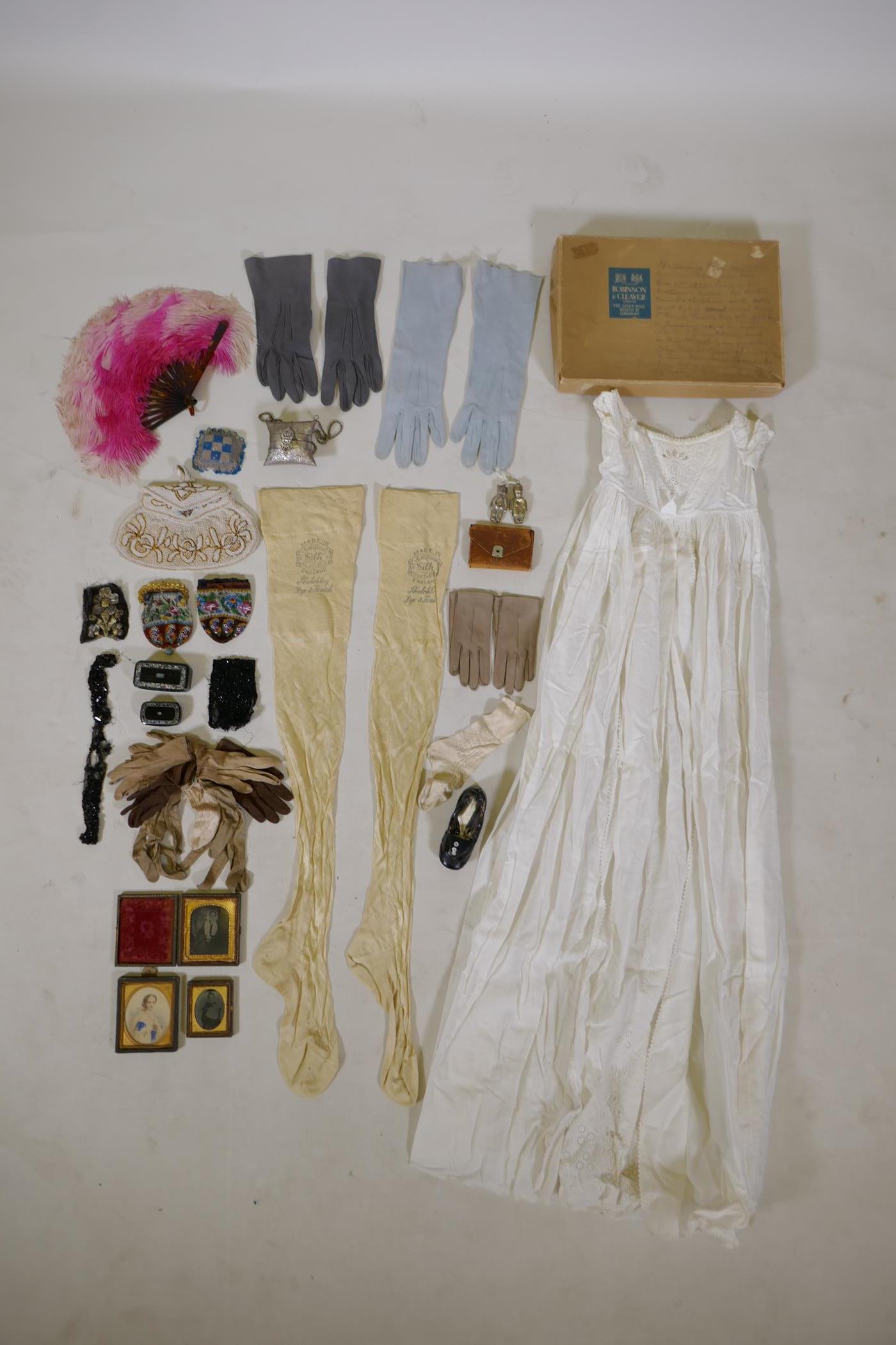 A quantity of vintage lace and linen, including a mid C19th christening gown, gloves, lace