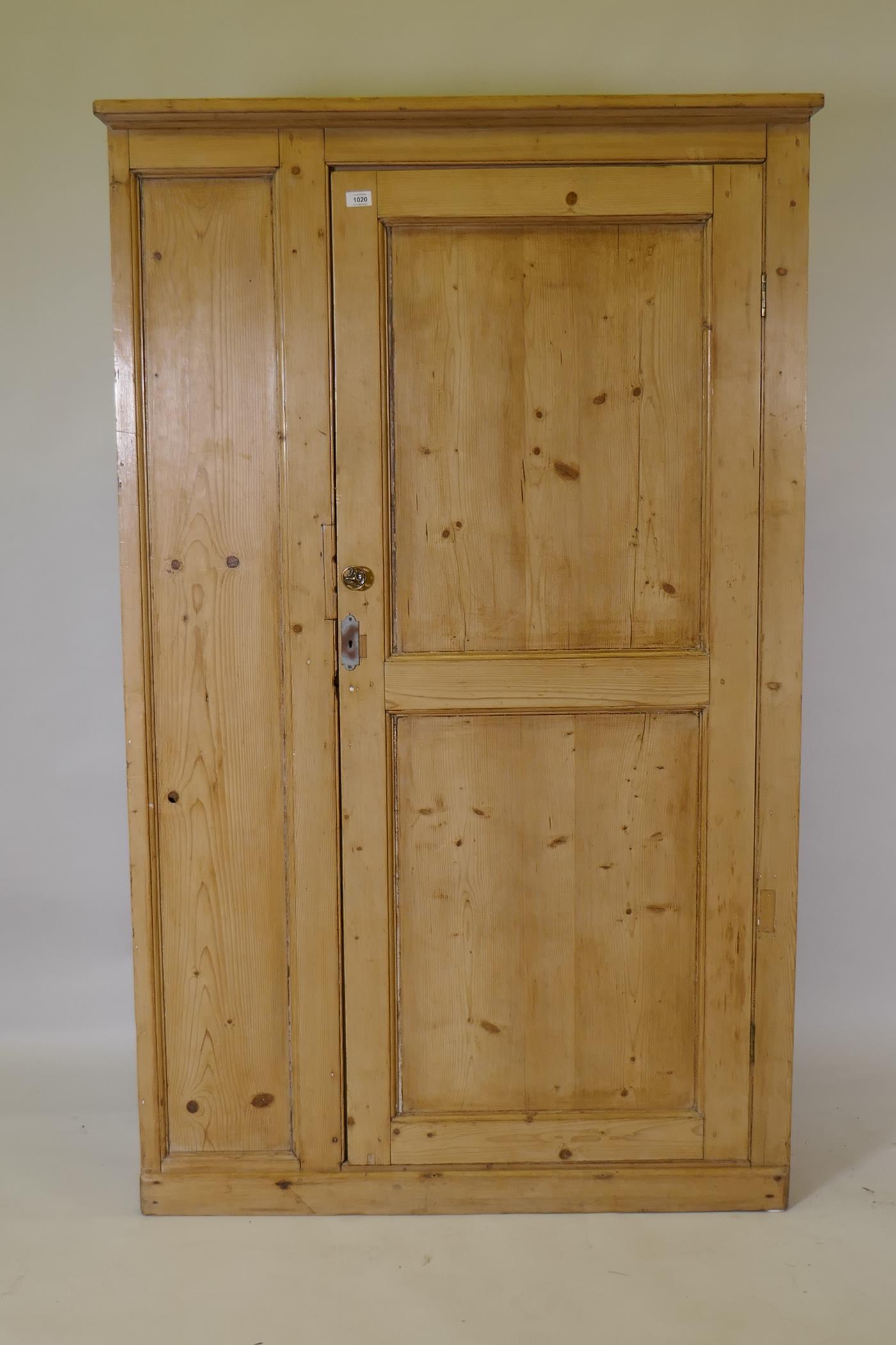 A C19th stripped pine housekeeper's cupboard with single door, adapted, 110 x 30 x 178cms