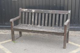 A slatted teak garden bench, 150cm wide