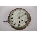 A mid C20th brass cased Smiths eight day bulk head ship's clock, 17cm diameter, AF glass chipped