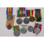 A collection of WWII medals including Campaign and Defence pair with miniatures, French Normandy