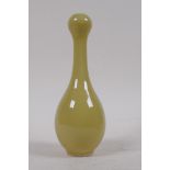 Chinese yellow glazed bud vase, blue circles to base, 17cm high
