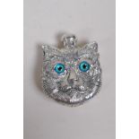 A white metal Louis Wain style perfume bottle in the form of a cat's head, the cover marked 800, 6 x