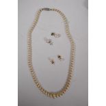 A graduated pearl necklace with 9ct white gold clasp, 45cms long, and two pairs of pearl stud