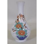 A Chinese porcelain vase with enamel decoration, factory mark and label to base, 25cm high
