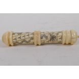 A Chinese carved bone needle case with engraved and inked decoration, 16cm long