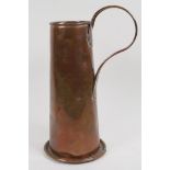 A copper jug engraved with emblem and name of the Sword and Serpent Inn, 34cm high