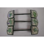 A set of six painted iron herb markers