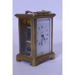 A French brass carriage clock, the enamel dial inscribed Bayard, the movement and case Duverdrey &