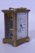 A French brass carriage clock, the enamel dial inscribed Bayard, the movement and case Duverdrey &