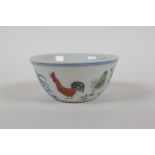 A doucai porcelain tea bowl with chicken decoration, Chinese Chenghua 6 character mark to base,