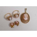 A 9ct gold pendant set with a cameo, 6.7g, a 9ct gold cameo set ring, size K, a yellow metal cameo