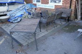 A suite of metal and wood garden furniture comprising a table with slatted top, 70 x 135 x 85cms,