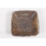 A square section white metal brush wash decorated with dragons and Chinese characters, 8cm square