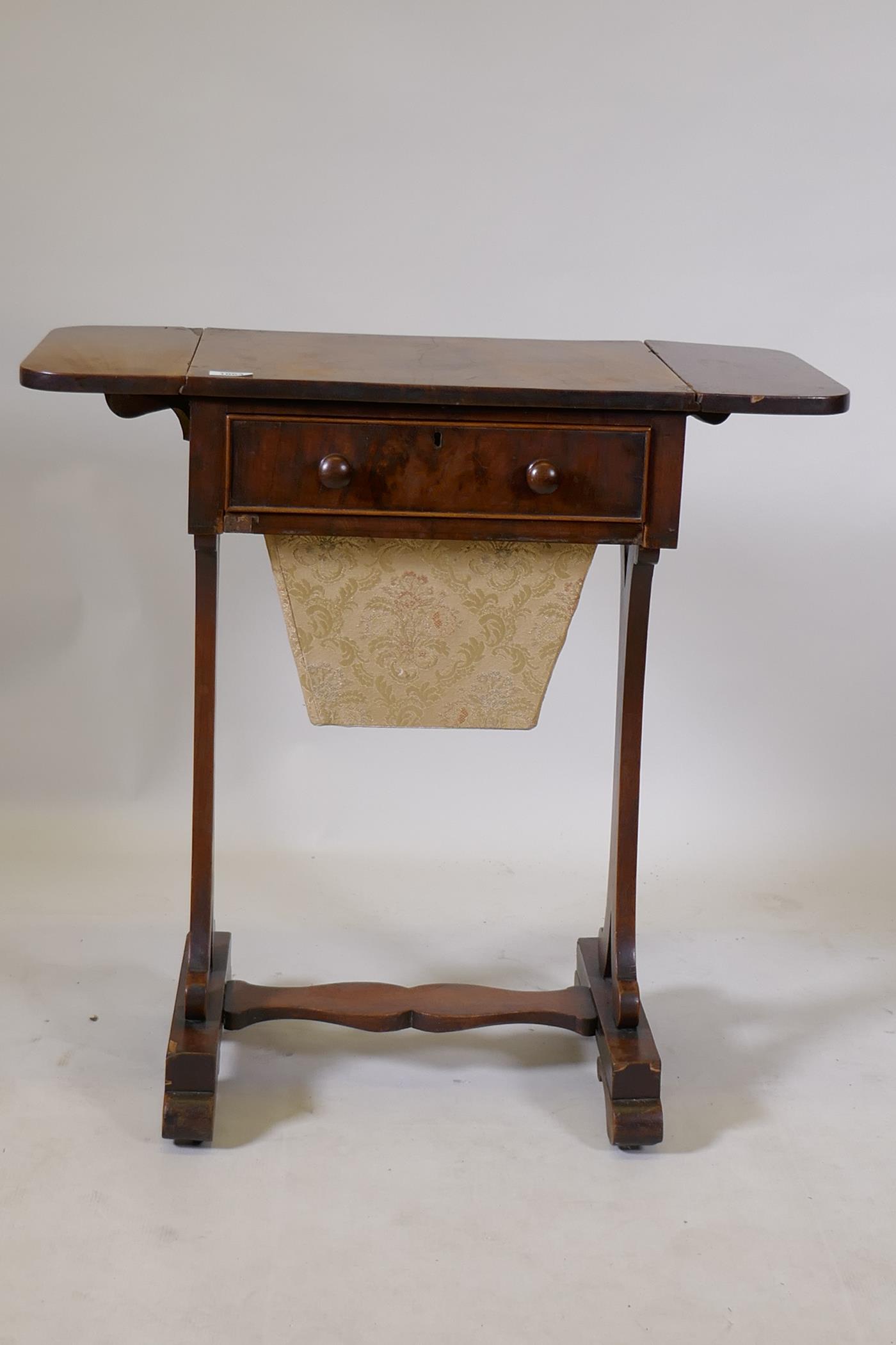 An early C19th mahogany worktable with single drawer and pull out basket, and drop end flaps, raised - Image 3 of 6