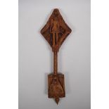 An Ethiopian carved wood coptic cross with figural decoration, 42cm long