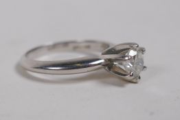 A platinum and diamond single stone engagement ring, approx 60 points, size I/J