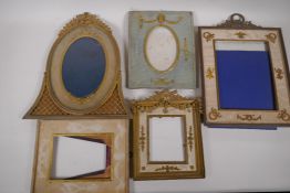 A brass and ormolu photo frame with Empire style decoration and watered silk border, late C19th/