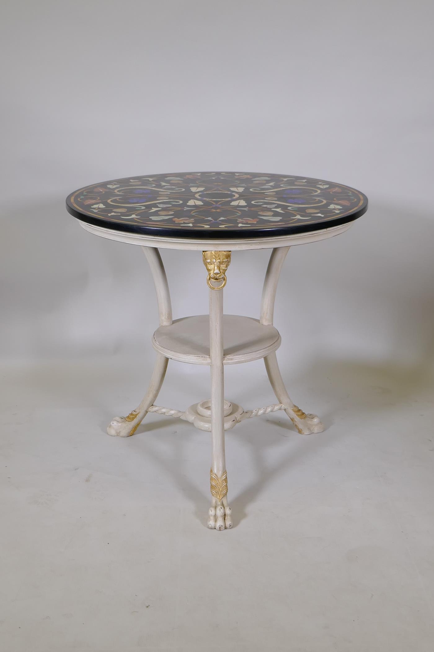 A slate top centre table, inlaid with specimen stones, lapiz, malachite, jade and agate, raised on a