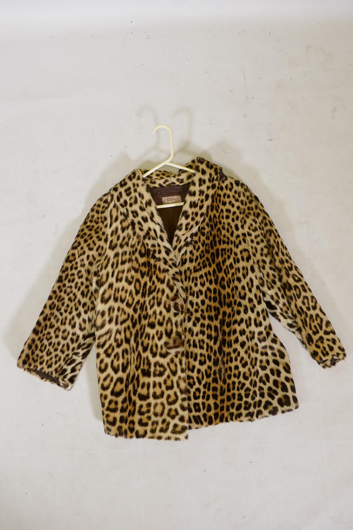 A vintage lady's leopard skin coat, retailed by K. West, London and Brighton, 77cm long