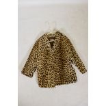 A vintage lady's leopard skin coat, retailed by K. West, London and Brighton, 77cm long