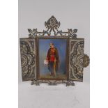 A miniature portrait of a military gentleman, in a pierced and bejewelled metal frame, image 9 x