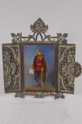 A miniature portrait of a military gentleman, in a pierced and bejewelled metal frame, image 9 x