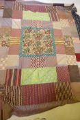 A vintage patchwork cover, 220 x 260cms, and a tasseled silk pashmina