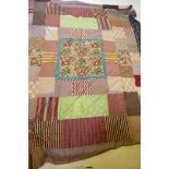 A vintage patchwork cover, 220 x 260cms, and a tasseled silk pashmina