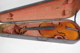A vintage violin in hardwood fitted case, violin 56cm long