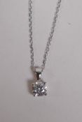 An 18ct white gold and diamond pendant necklace, approx 41 points