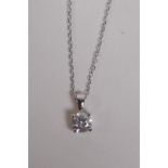 An 18ct white gold and diamond pendant necklace, approx 41 points