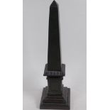 A C19th Welsh carved stone obelisk inscribed to the base John Williams, and dated 1880, 38cm high