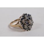 A 9ct yellow gold sapphire and diamond cluster ring, size P