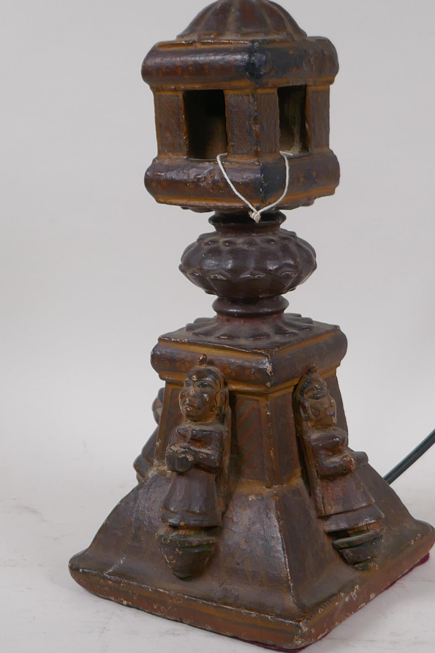 An Indian carved wood table lamp in the form of a temple with applied figural decoration, 44cm high - Image 2 of 4