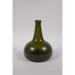 An C18th onion shaped olive green glass wine bottle, 19cm high