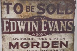 An enamelled two sided advertising sign for Edwin Evans estate agents, 60 x 46cms