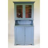A Scandinavian painted wood dresser with glazed upper section over two cupboard door base, 215 x 100