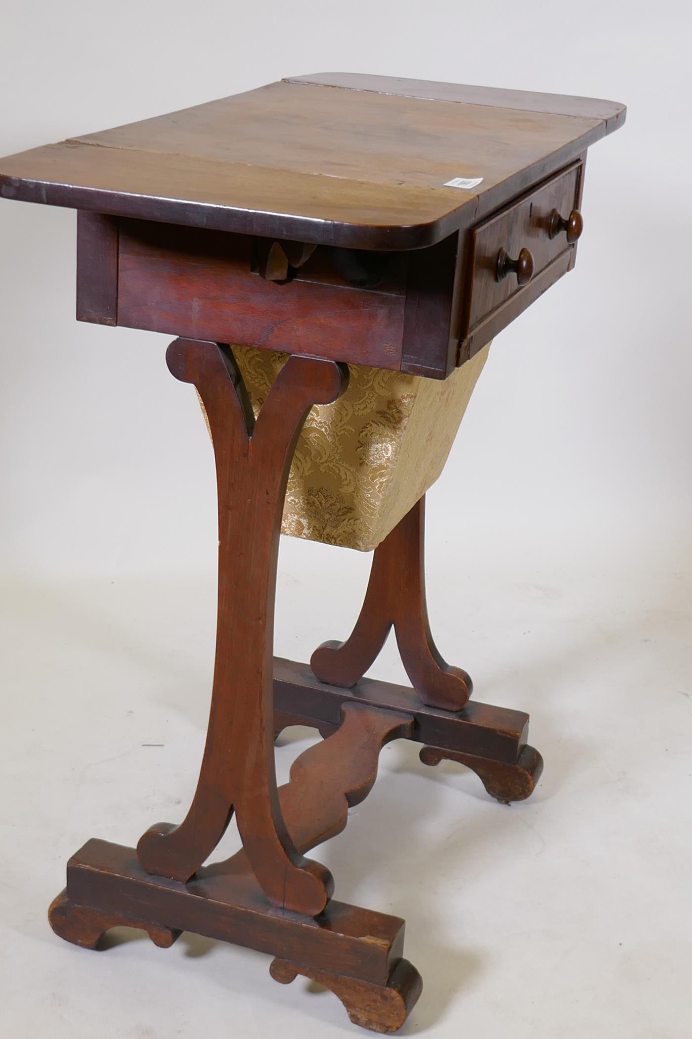 An early C19th mahogany worktable with single drawer and pull out basket, and drop end flaps, raised - Image 6 of 6