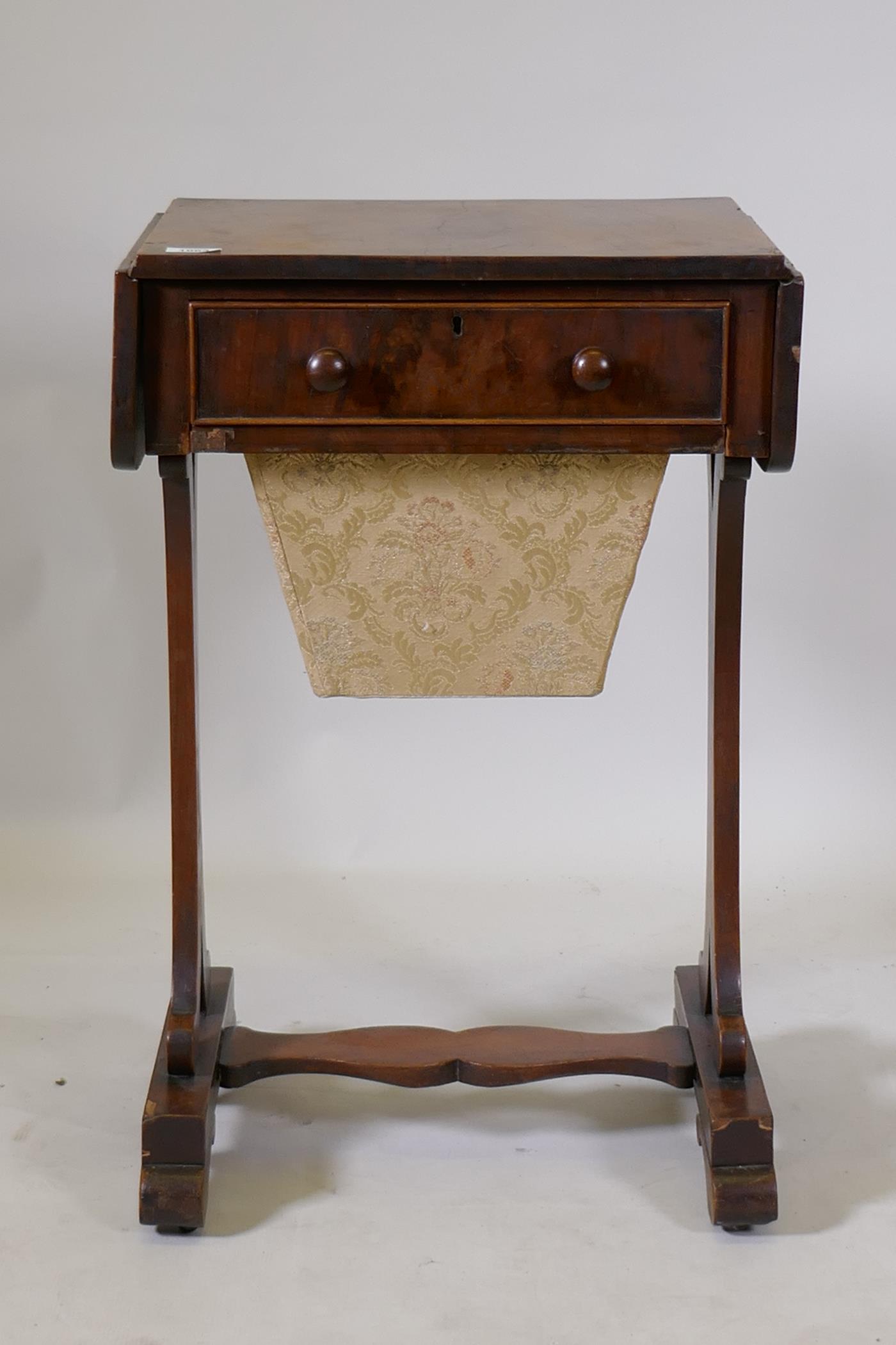 An early C19th mahogany worktable with single drawer and pull out basket, and drop end flaps, raised - Image 2 of 6