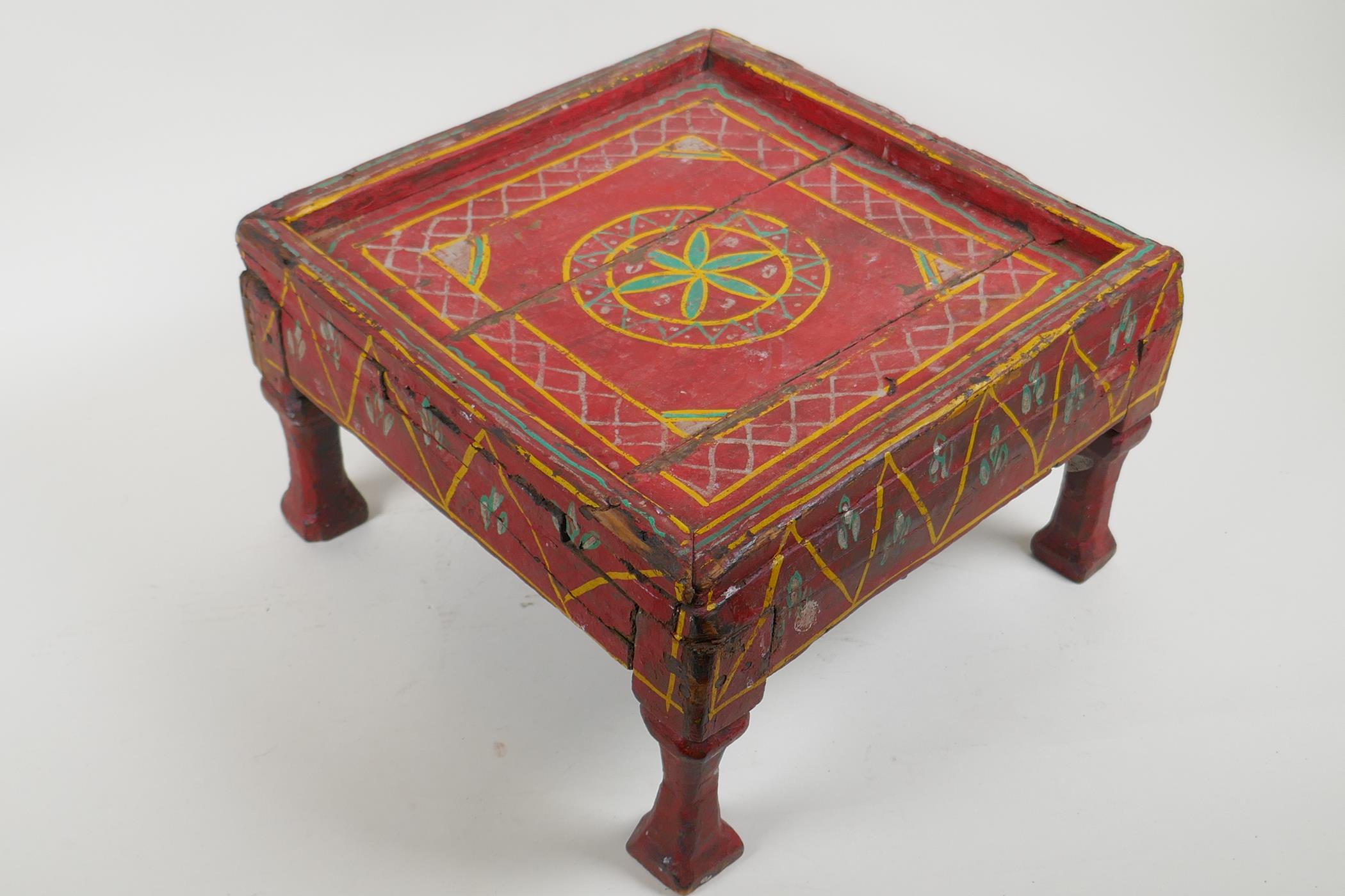 An antique painted footstool, 17cm high, 29cm square - Image 5 of 5