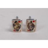 A pair of sterling silver cuff links set with cold enamel plaques depicting playing cards