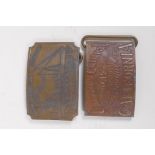 A pair of Tiffany style brass belt buckles advertising 'Wells Cargo' and 'Union Central', 9 x 6cm