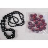 A vintage graduated, faceted bead necklace, 84cm long, and 16 round beads