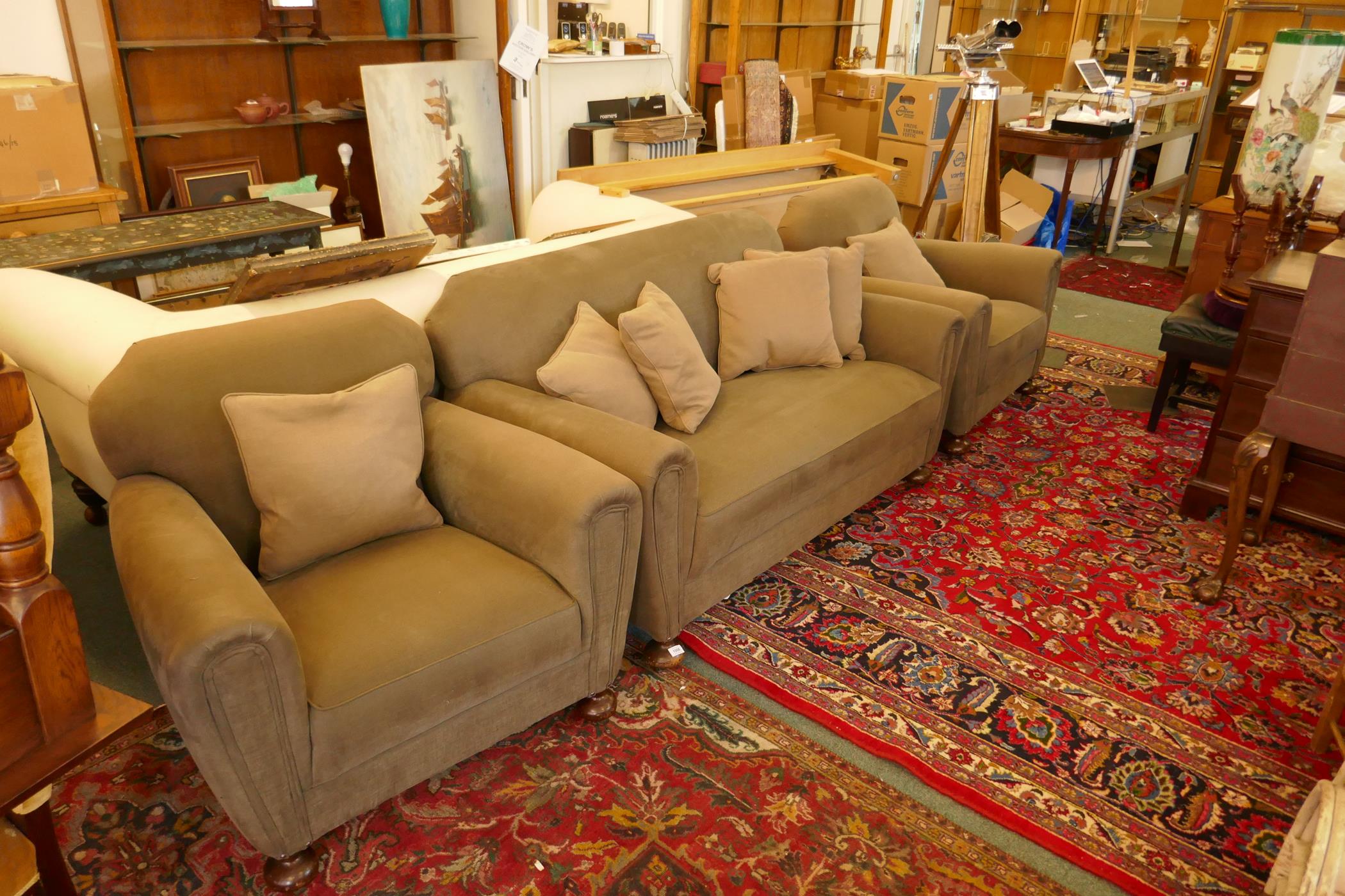 An Art Deco three piece suite, settee and two armchairs, well upholstered in a neutral fabric, 145cm - Image 6 of 6