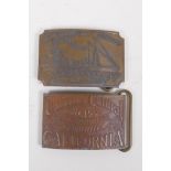 A pair of Tiffany style brass belt buckles advertising 'Wells Cargo' and 'Union Central', 9 x 6cm