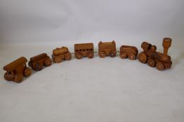 A vintage hand made wood train set, loco 24cm high, 25cm long