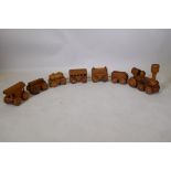 A vintage hand made wood train set, loco 24cm high, 25cm long