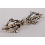 A white metal vajra, 9cm long